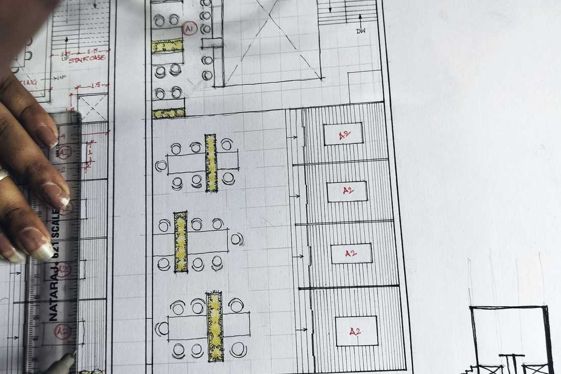 Floor plans spread across a table