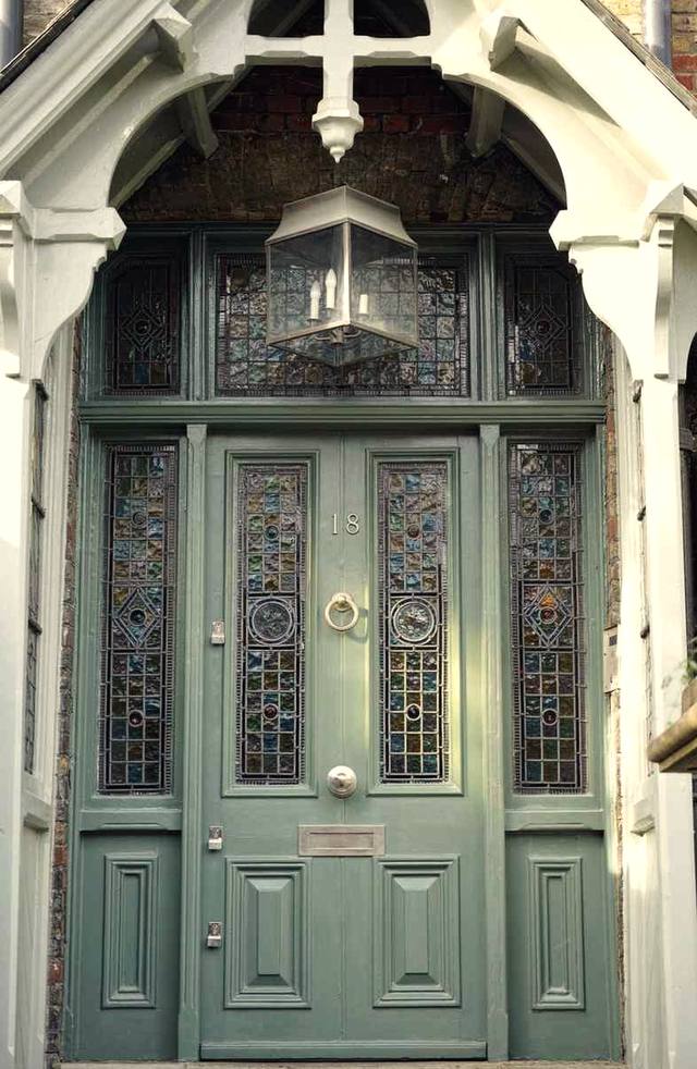 The panelled green front door of the Kettle and Key office