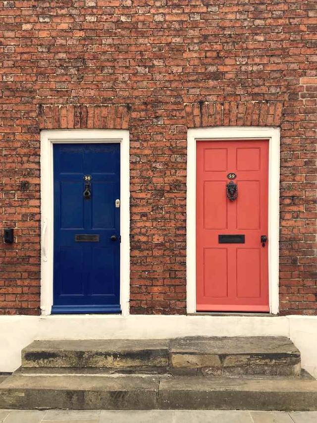 Victorian terraced houses with painted front doors in East Dulwich
