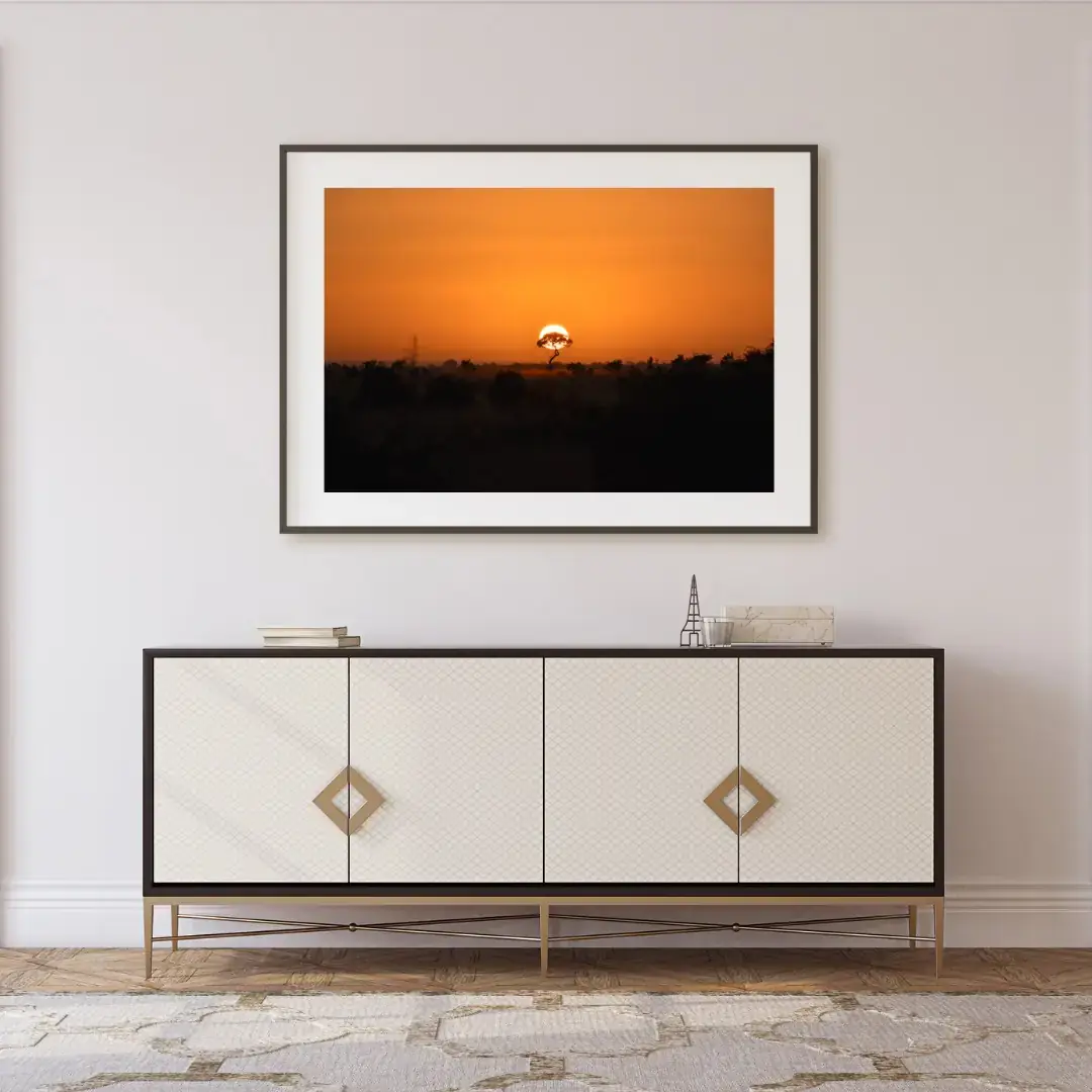 Orange Horizon: room mock-up of the print (sunrise), framed on a wall